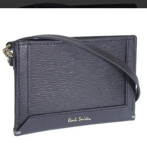 Check out Paul Smith!!Black Textured Leather card holder. NWOT.  Men or women’s